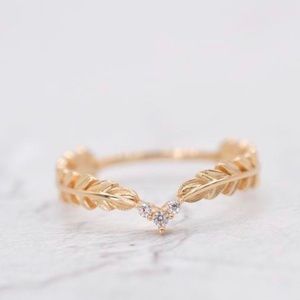 ROUND WHITE SAPPHIRE RING